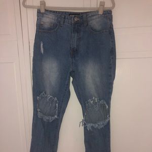 Mid-rise distressed jeans